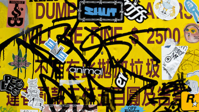 Yellow sign with graffiti and stickers (picture taken with Canon EOS 40D and Canon EF 16-35mm F2.8 L USM)