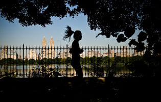 Girl running around Central Park