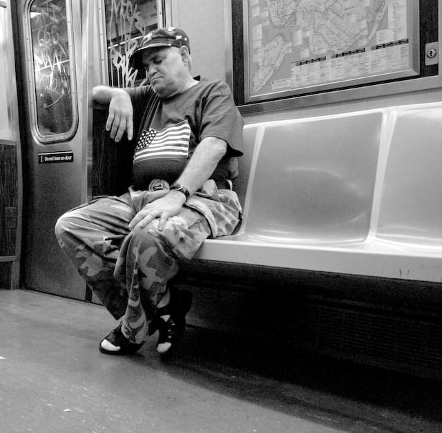 Gentleman is sleeping on subway after a working day (picture taken with Nikon D80 and Nikon AF-S DX 17-55mm F2.8 G ED )