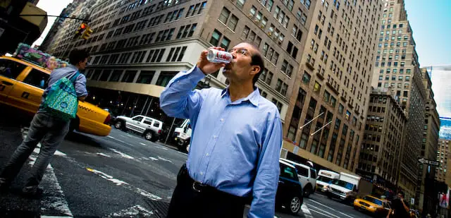 Business man drinking a Diet Coke (picture taken with Canon EOS 1D Mark III and Canon EF 16-35mm F2.8 L USM)