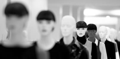 Mannequins lined up inside store
