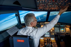 Airline Pilot is approaching New York in his simulator