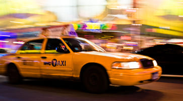 The classic yellow NYC cab, with yellow background